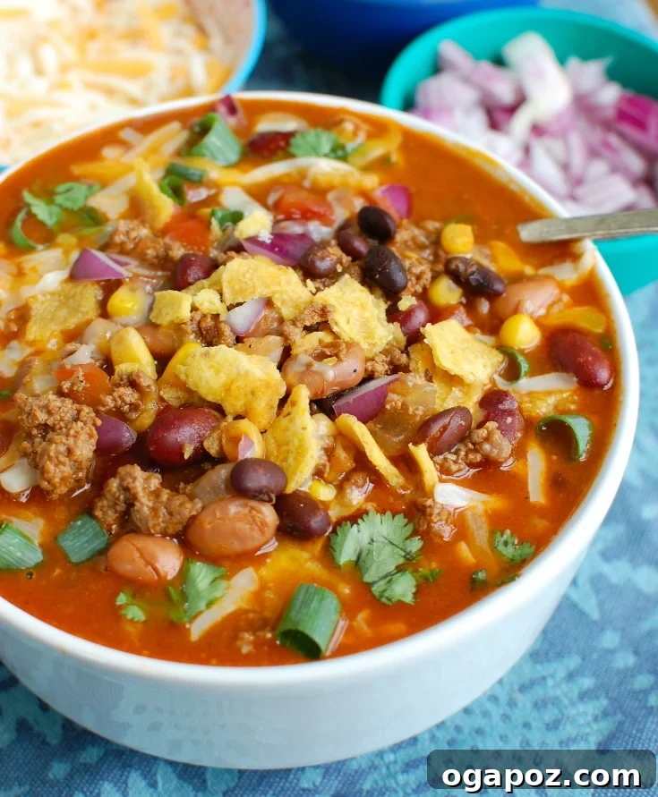 Instant Pot Zesty Taco Delight 2 Hearty Instant Pot Taco Soup served in a white bowl, garnished with fresh cilantro.
