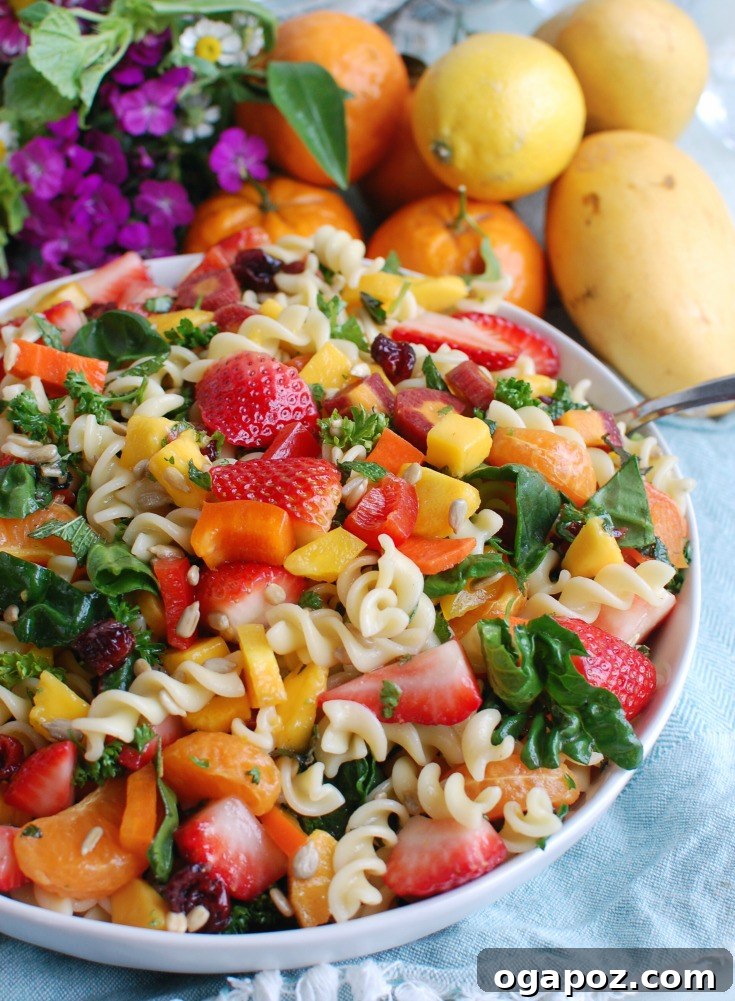 Fresh Spring Pasta Salad served as a side dish, showcasing vibrant fruits and vegetables