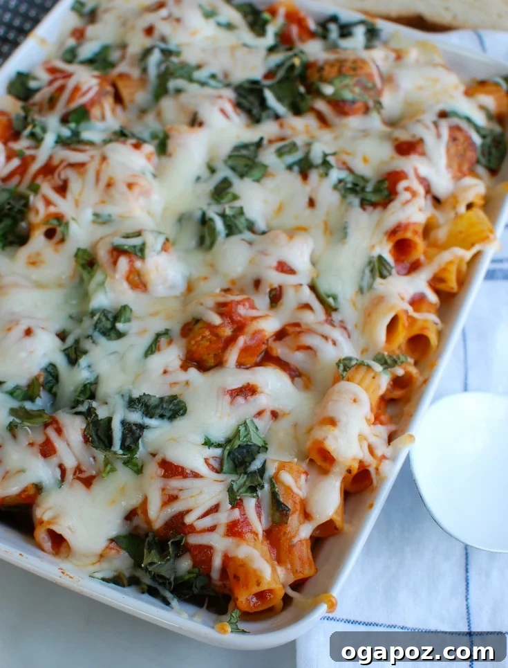 Comforting Baked Rigatoni with Tender Chicken Meatballs 3 Close-up of fresh basil, raw rigatoni pasta, and chicken meatballs, ready for the baked rigatoni recipe.