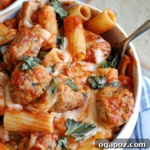 Easy Baked Rigatoni with Chicken Meatballs in white bowl