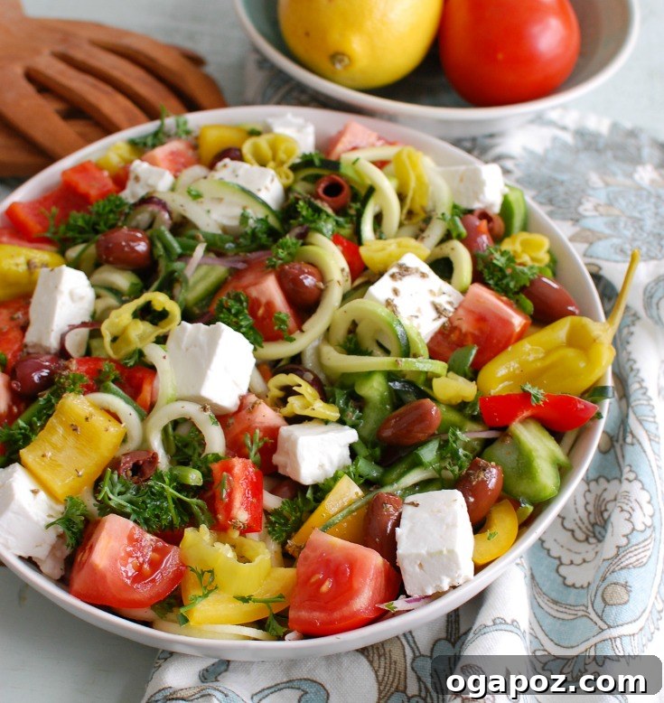 Close-up of Spiralized Greek Style Salad showing zucchini and cucumber noodles