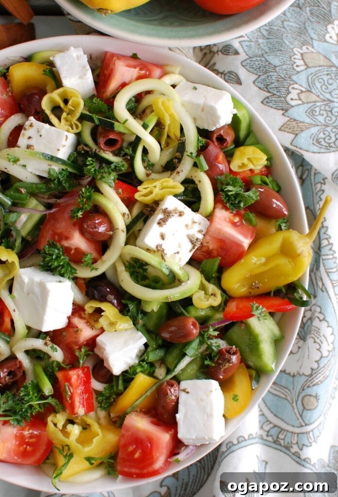 Spiralized Greek Style Salad with a decorative napkin