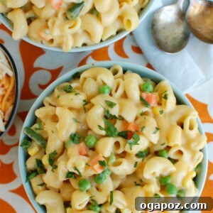 Instant Pot Vegetable Mac and Cheese in blue bowl, recipe card image.
