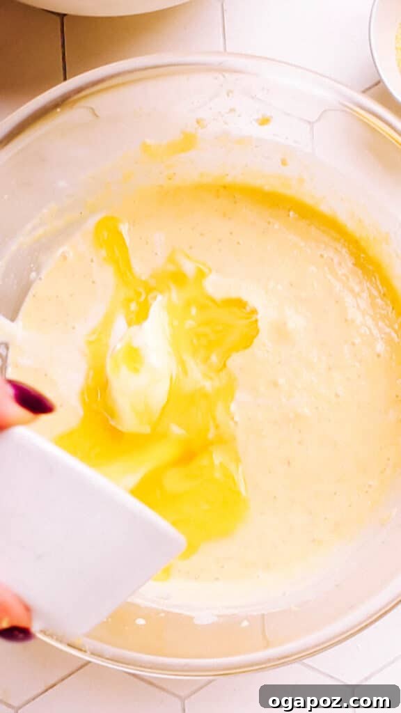 Golden Cornbread Delight 10 Mixing wet ingredients Cornbread Casserole.