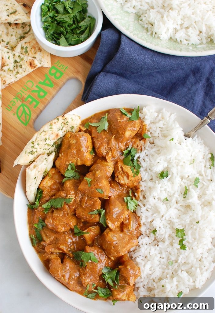 Meltingly Tender Slow Cooker Butter Chicken 2 Slow Cooker Butter Chicken served with basmati rice and naan