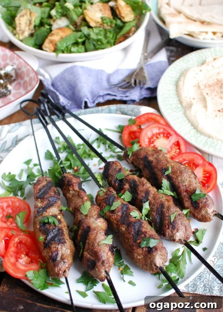 Flavorful Grilled Beef Kafta Kabobs 6 Grilled Beef Kafta Kebabs on plate