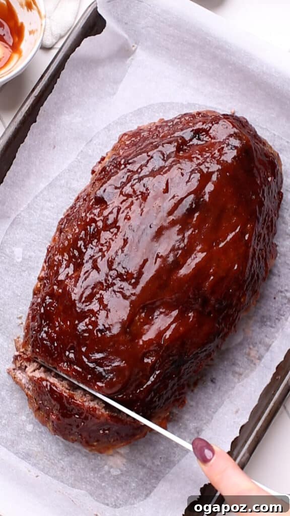 Lipton's Signature Meatloaf 8 A knife slicing into a freshly baked Lipton Meatloaf.