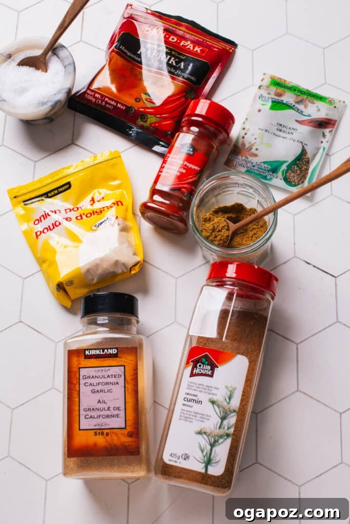 Secret Chili Seasoning Recipe 5 A vibrant collection of spices, including paprika, cumin, and cayenne pepper, beautifully arranged as the key ingredients for a homemade chili seasoning recipe.