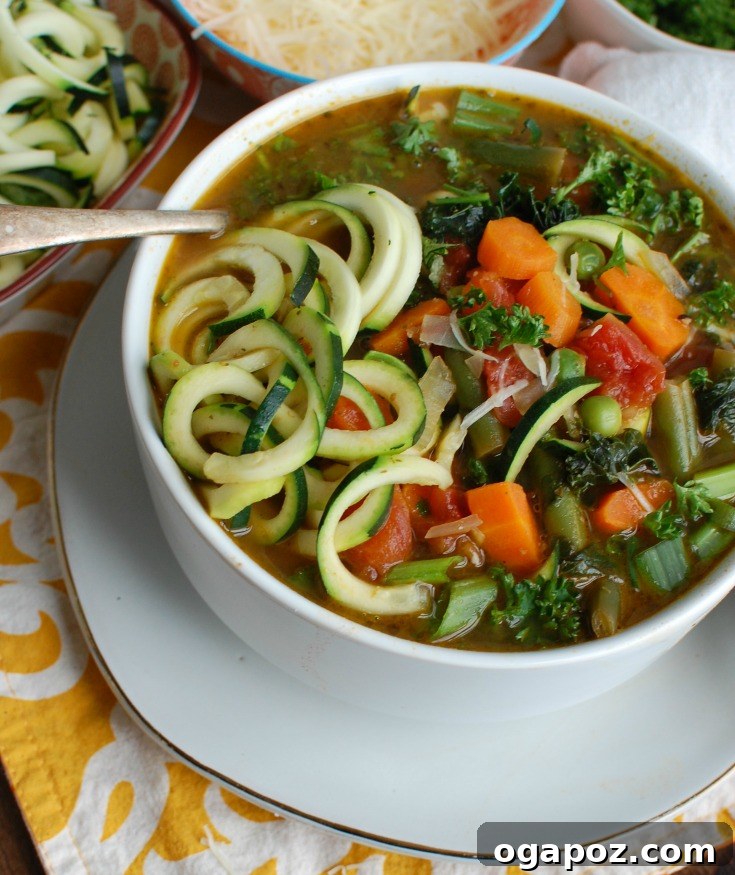 Vibrant Spring Minestrone 8 A beautifully presented bowl of Spring Vegetable Minestrone, garnished with fresh herbs and a drizzle of pesto.