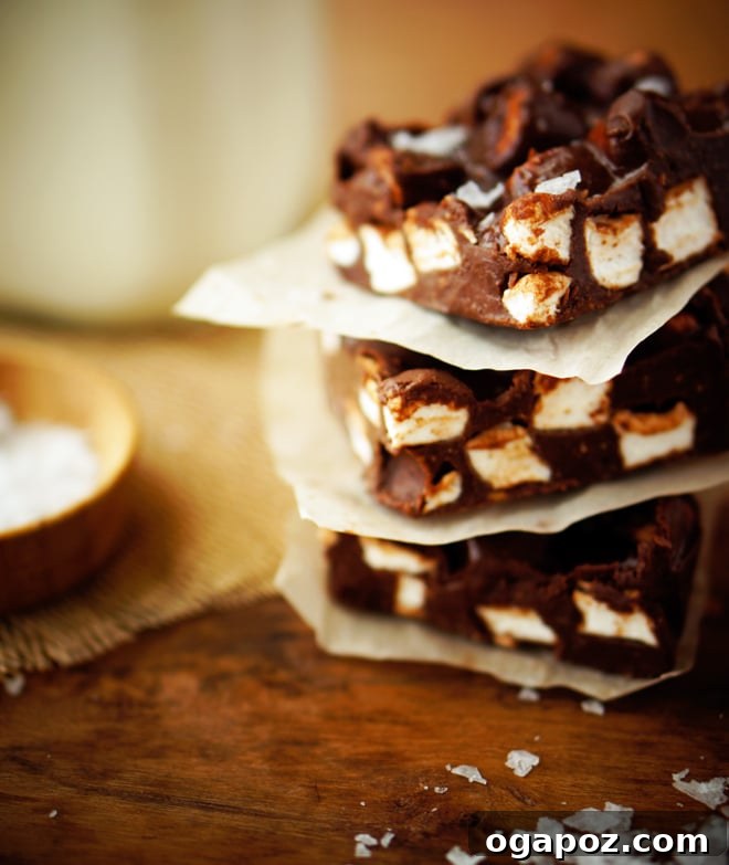 Salted Chocolate Peanut Butter Marshmallow Squares 3 A close-up image of intricate lace details on a wedding dress, symbolizing the importance of the gown.