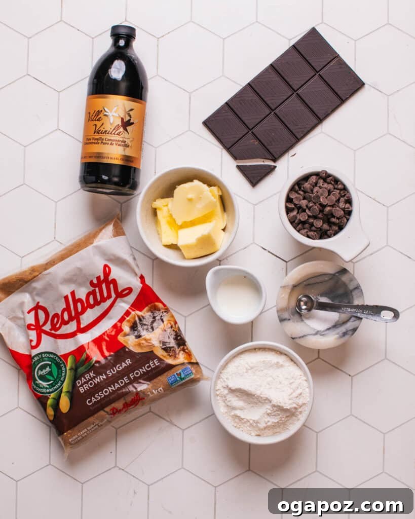 Effortless Cookie Dough Bites 4 A flat lay of all ingredients for cookie dough bites: flour, butter, brown sugar, vanilla, milk, chocolate chips, and salt.