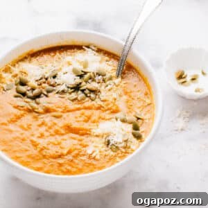 A beautifully presented bowl of Autumn Squash Soup.