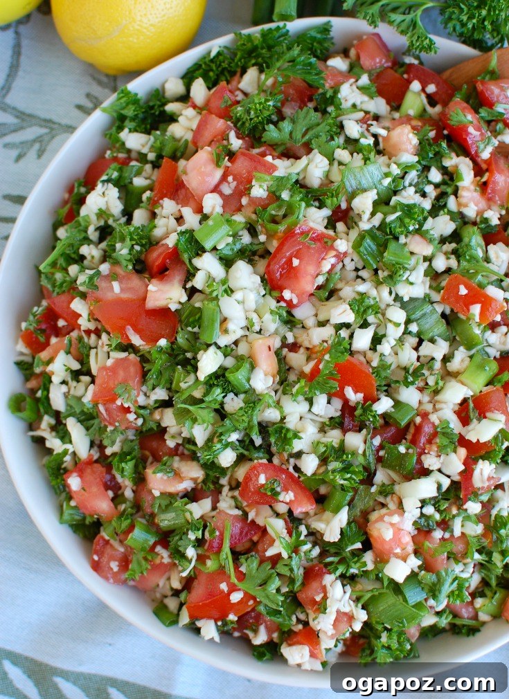 Riced Cauliflower Tabbouleh 5 Large bowl of Cauliflower Tabbouleh, garnished and ready for serving.