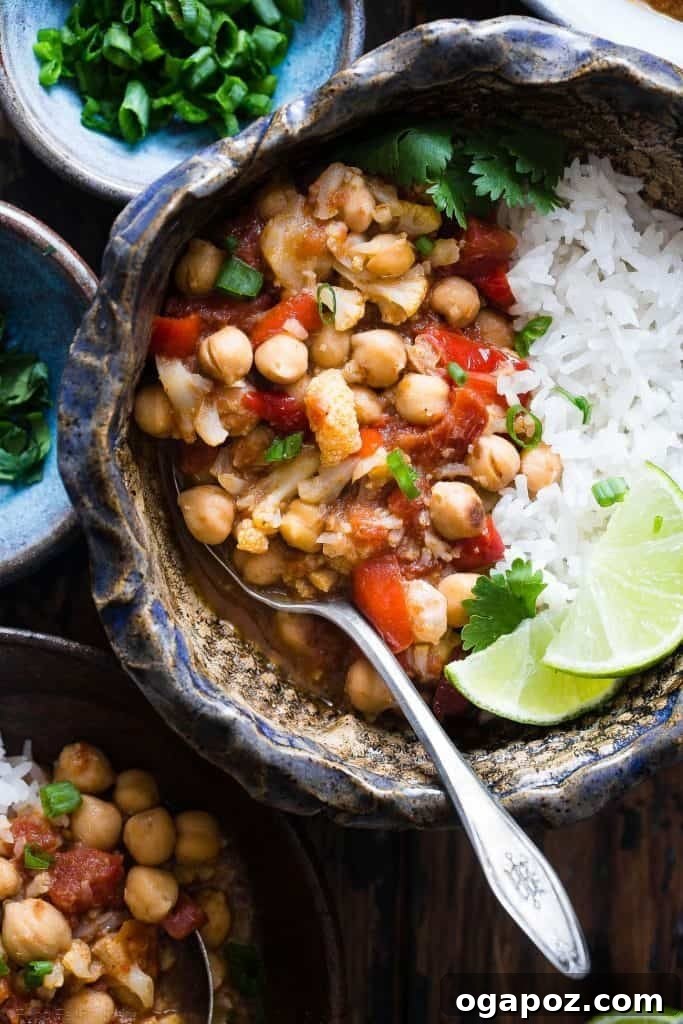 13 Instant Pot Recipes You'll Make Again and Again 9 Easy Vegan Instant Pot Cauliflower Chickpea Curry, a fragrant and spicy plant-based meal.