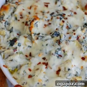 Zesty Lemon Artichoke Spinach Dip 6 Lemon Spinach Artichoke Dip in a white square dish