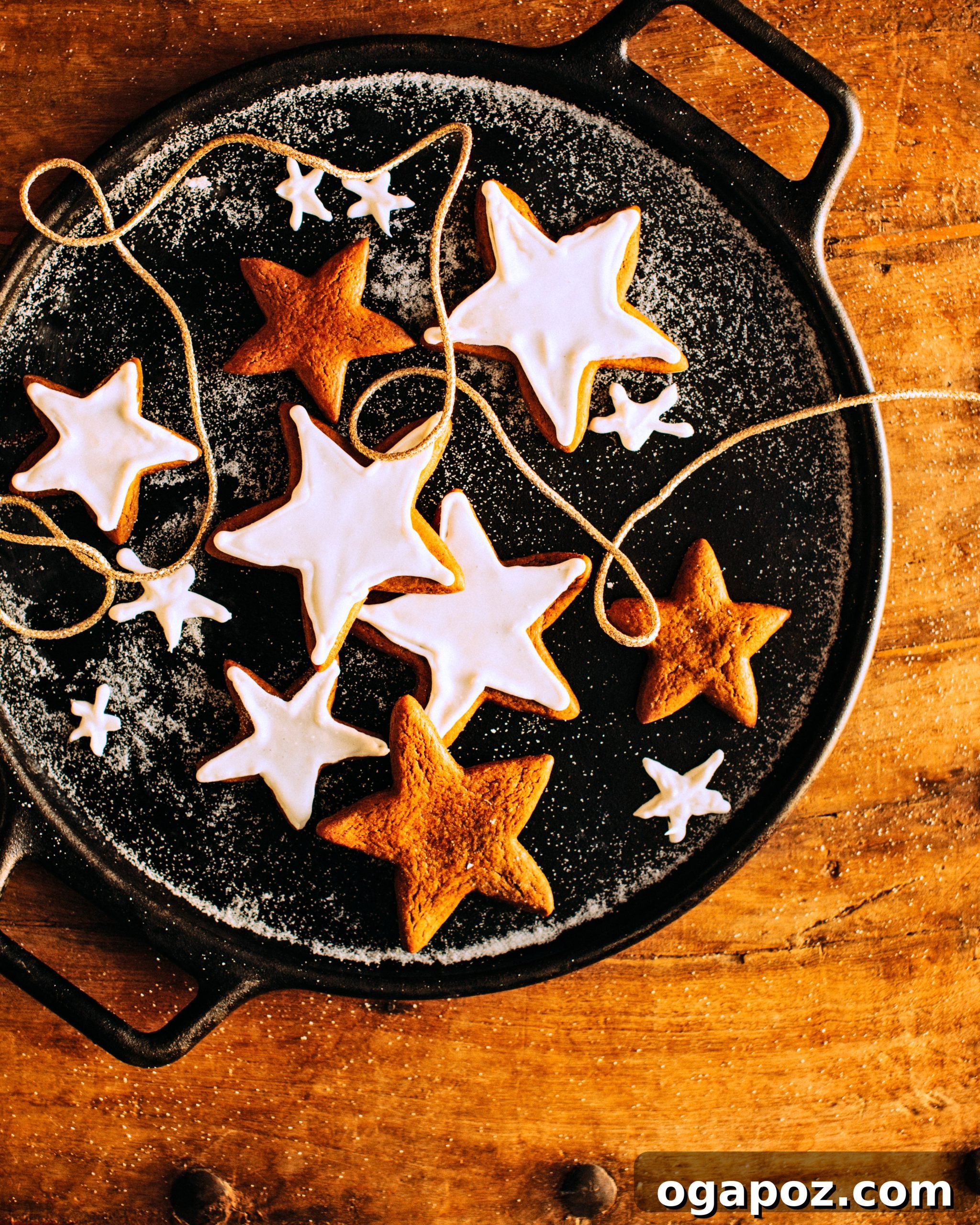 Yuletide Gingerbread Star Cookies 3 Beautifully decorated gingerbread cookies with a warm, golden glow from natural light