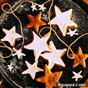 Delicious Christmas Gingerbread Stars decorated with white icing