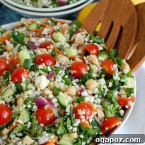 A hero shot of the Mediterranean Chickpea Cauliflower Salad in a serving bowl.