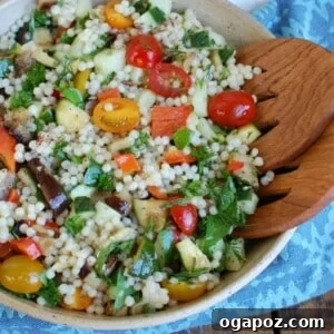 Mediterranean Grilled Vegetable Couscous Salad in a recipe card format, showcasing its fresh and healthy appeal.