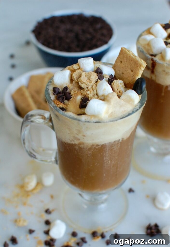 S'mores A&W Root Beer Floats 6 A single S'mores A&W Root Beer Float in a glass, topped with s'mores ingredients