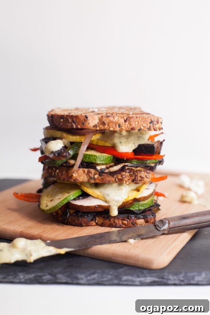 14 Sun-Kissed Mediterranean Grilling Recipes 14 Gourmet Grilled Vegetable Sandwich with pesto feta mayo, featuring layers of perfectly grilled seasonal vegetables.