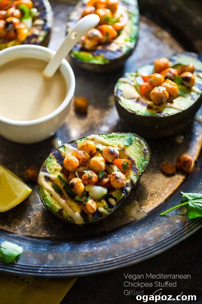 14 Sun-Kissed Mediterranean Grilling Recipes 8 Healthy Vegan Grilled Avocado halves generously stuffed with seasoned chickpeas and drizzled with tahini sauce.