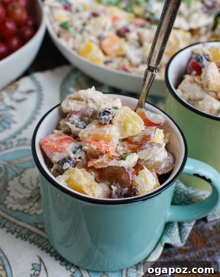 Island Breeze Chicken Salad 3 Tropical Chicken Salad served in individual cups, showcasing its vibrant colors and fresh ingredients, ready for a grab-and-go lunch.