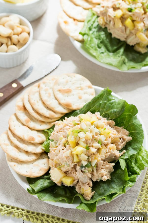 11 Effortless Chicken Salad Creations 10 Tropical Hawaiian Chicken Salad, featuring sweet pineapple chunks, crunchy macadamia nuts, and a creamy dressing.