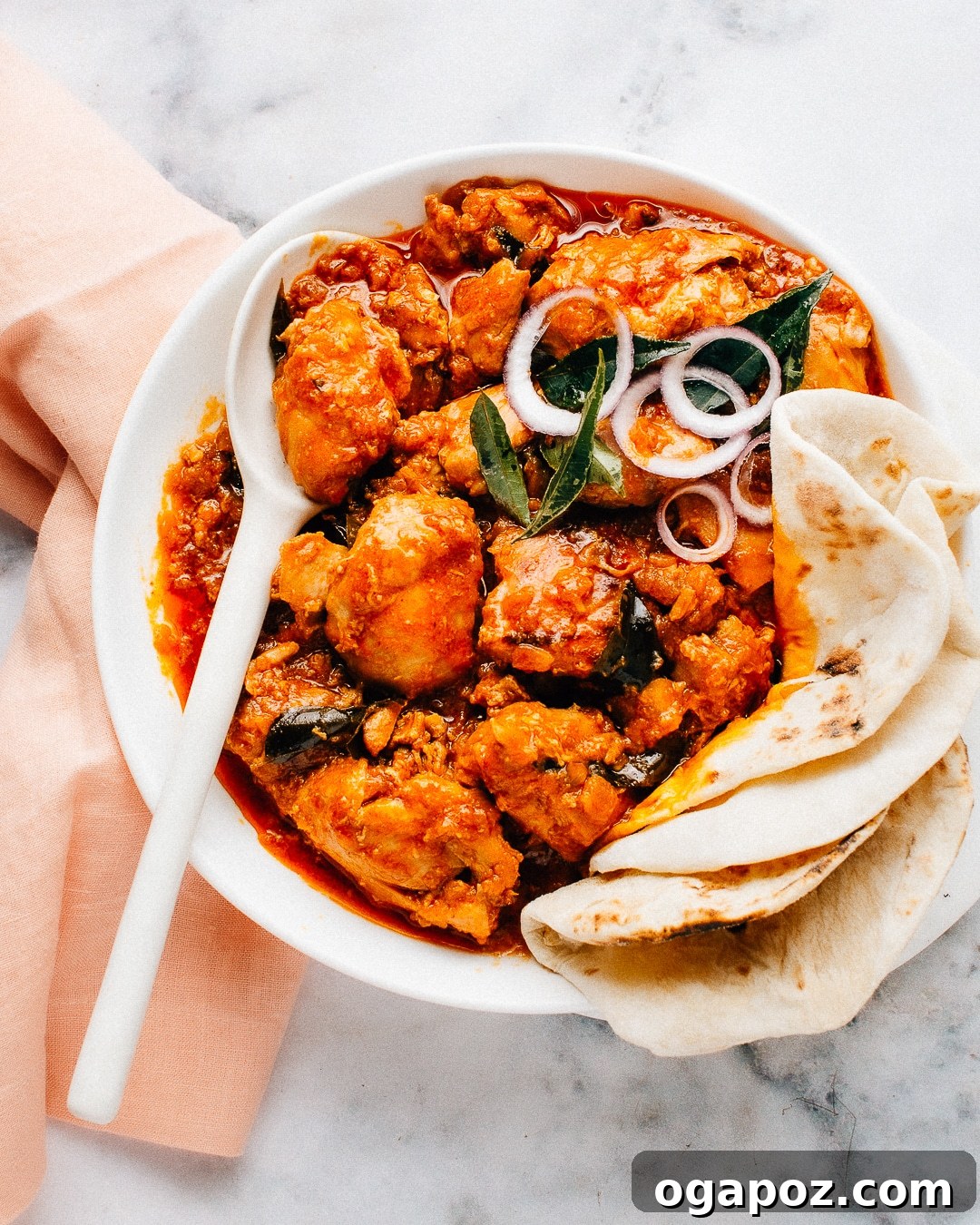 Chicken 65 A Zesty South Indian Classic 2 Chicken 65 Curry served in a huge white bowl with fluffy Indian flatbread