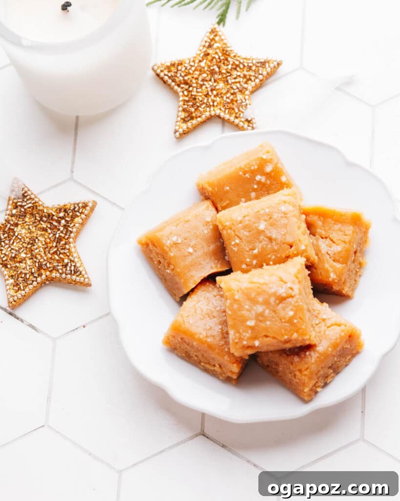 Two Ingredient Creamy Peanut Butter Fudge 2 Peanut Butter Fudge on a plate, cut into squares