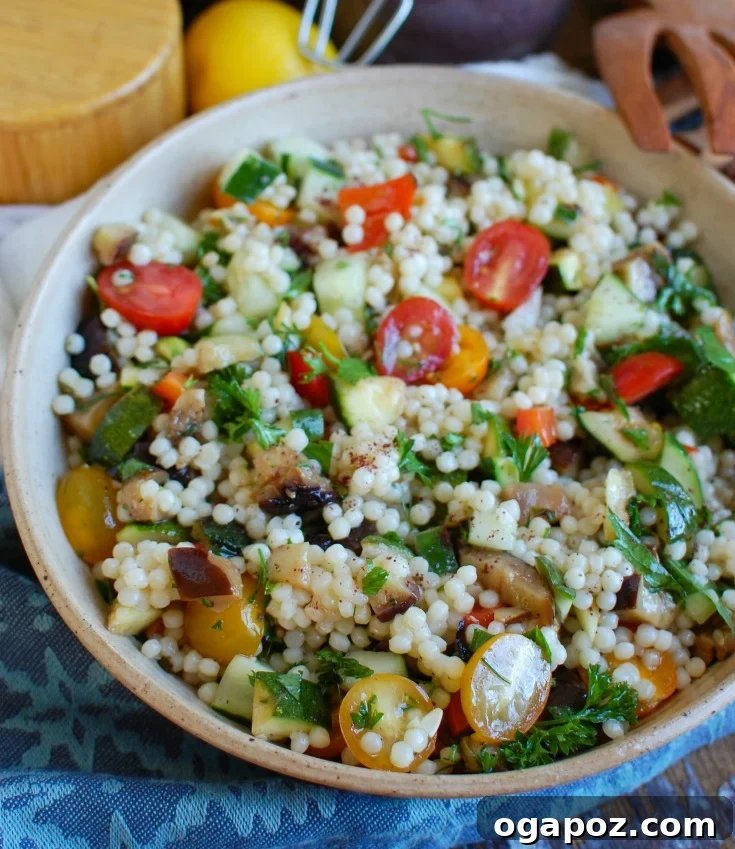 11 Ultimate Eggplant Recipes 13 A colorful Mediterranean Grilled Vegetable Couscous Salad featuring grilled zucchini, eggplant, bell peppers, tossed with couscous, tomato, cucumber, fresh herbs, and a light lemony dressing.