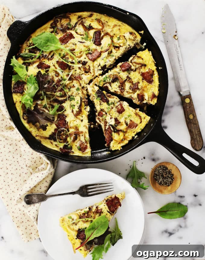 A golden-brown Potato Crusted Sausage Quiche, baked in a dish and ready to be served, highlighting its savory filling and unique potato crust.