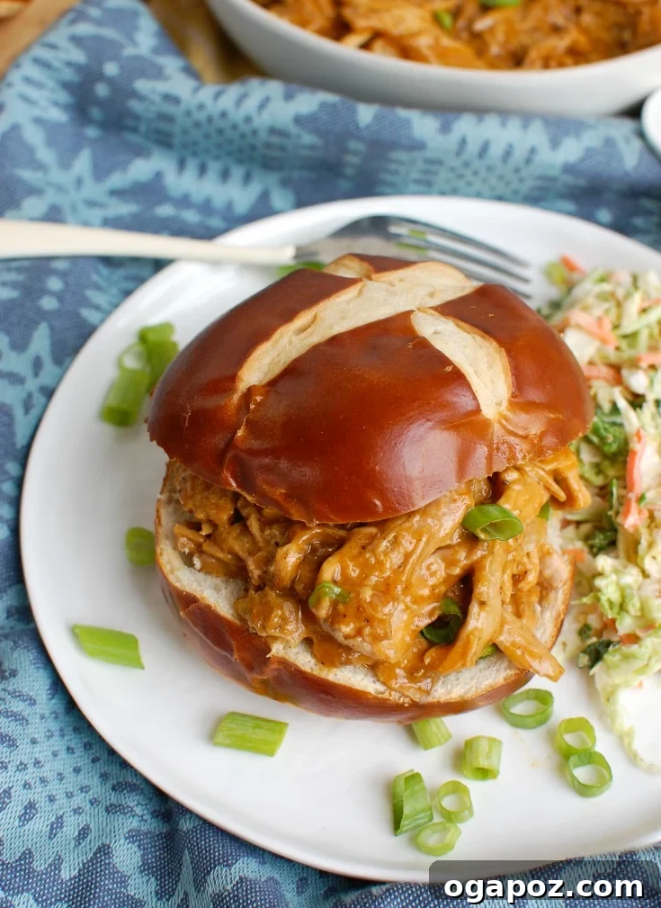 Effortless Slow Cooker Pork Tenderloin 4 Slow Cooker Pork Tenderloin cooking in the pot