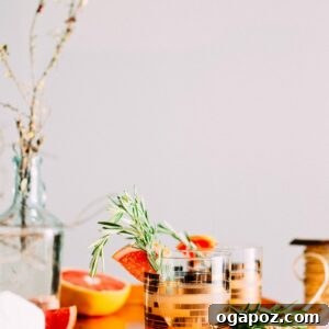 Rosemary-Grapefruit Gin Fizz cocktail with fresh ingredients