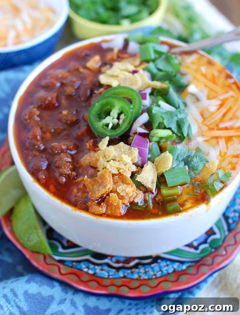 Hearty Instant Pot Beef Chili 2 Easy Instant Pot Beef Chili in a bowl with toppings