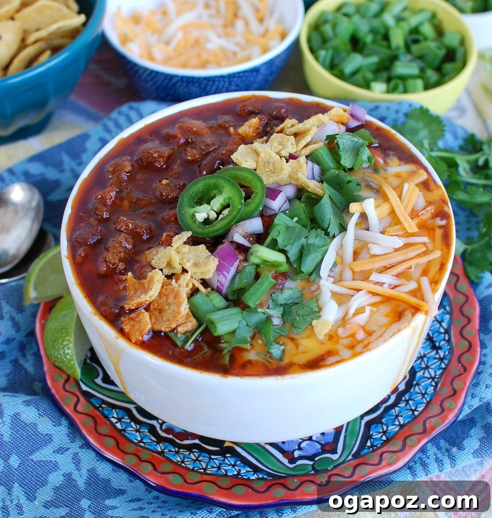 Hearty Instant Pot Beef Chili 4 Easy Instant Pot Beef Chili in a white bowl, overhead shot