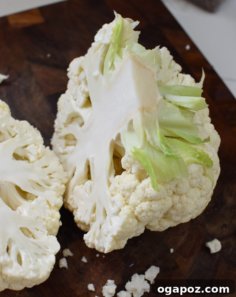 Buffalo Cauliflower Wings 6 A bowl of cauliflower florets seasoned and ready for roasting