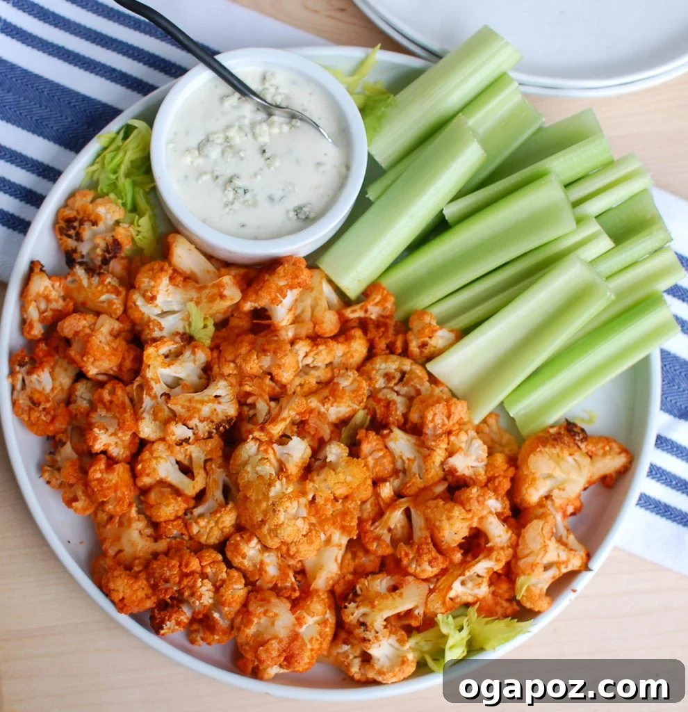 Buffalo Cauliflower Wings 7 A bowl of Roasted Buffalo Cauliflower, garnished and ready to be served