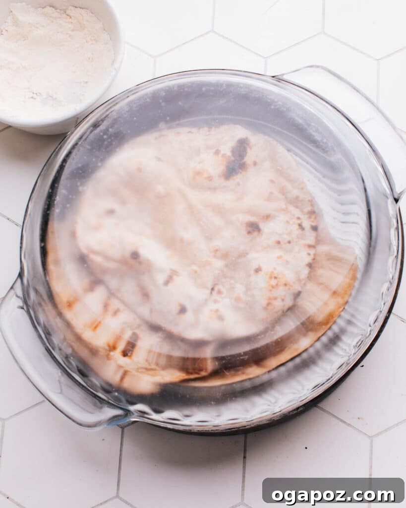 Pillowy Soft Roti A Time Tested Family Favorite 15 Adding roti in bowl