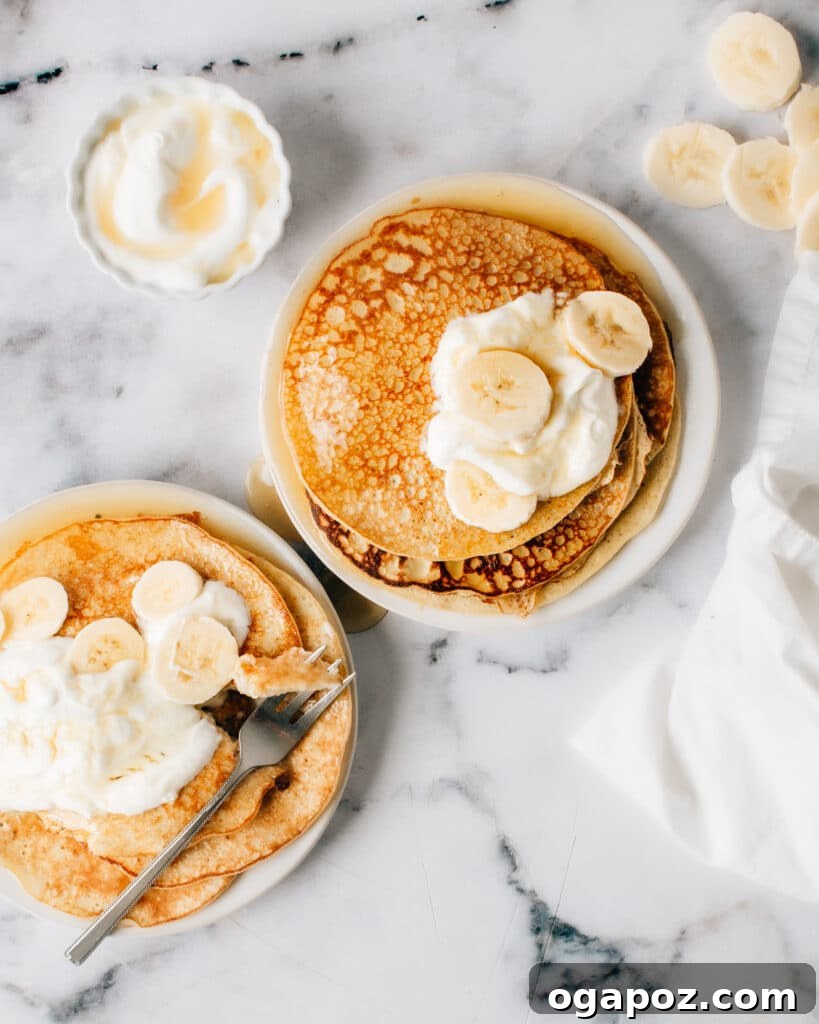 Wholesome Banana Bran Delights 8 A stack of golden brown pancakes garnished with fresh banana slices and a drizzle of syrup, illustrating a delicious and simple 3-ingredient banana pancake recipe.