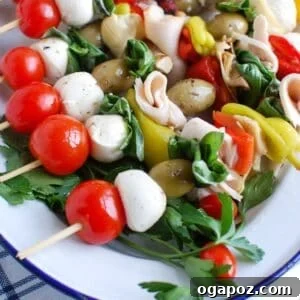 A close-up of a prepared Mediterranean Antipasto Skewer, showing all the ingredients threaded together.