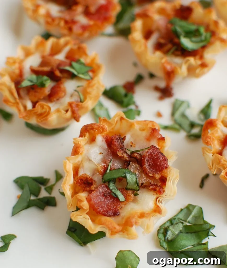 Cheesy Bacon Pizza Poppers 3 Bacon Pizza Bites garnished with fresh basil leaves