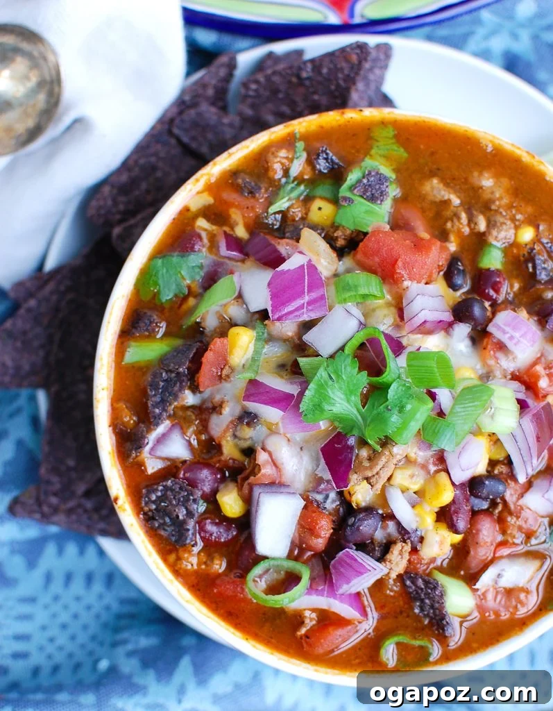 Hearty Instant Pot Turkey Chili 3 Instant Pot Turkey Chili in a white bowl with toppings