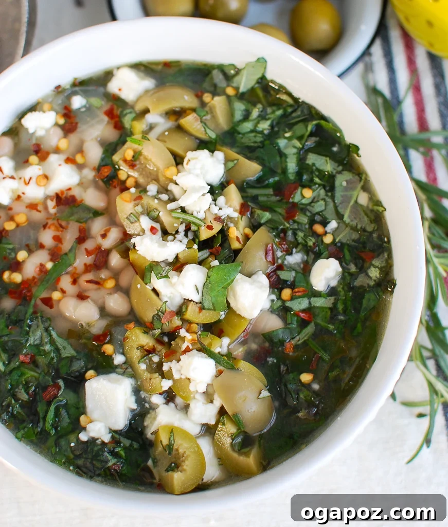 Rustic Mediterranean White Bean Soup 2 A bowl of Mediterranean White Bean Soup with creamy feta cheese and fresh herbs, ready to be enjoyed.