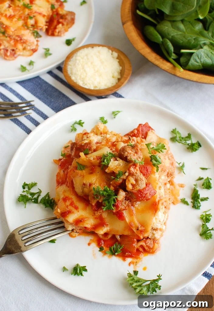 Slow Cooker Lasagna Perfection 2 Slow Cooker Lasagna with Fork ready to serve, showing layers of pasta, meat, and cheese