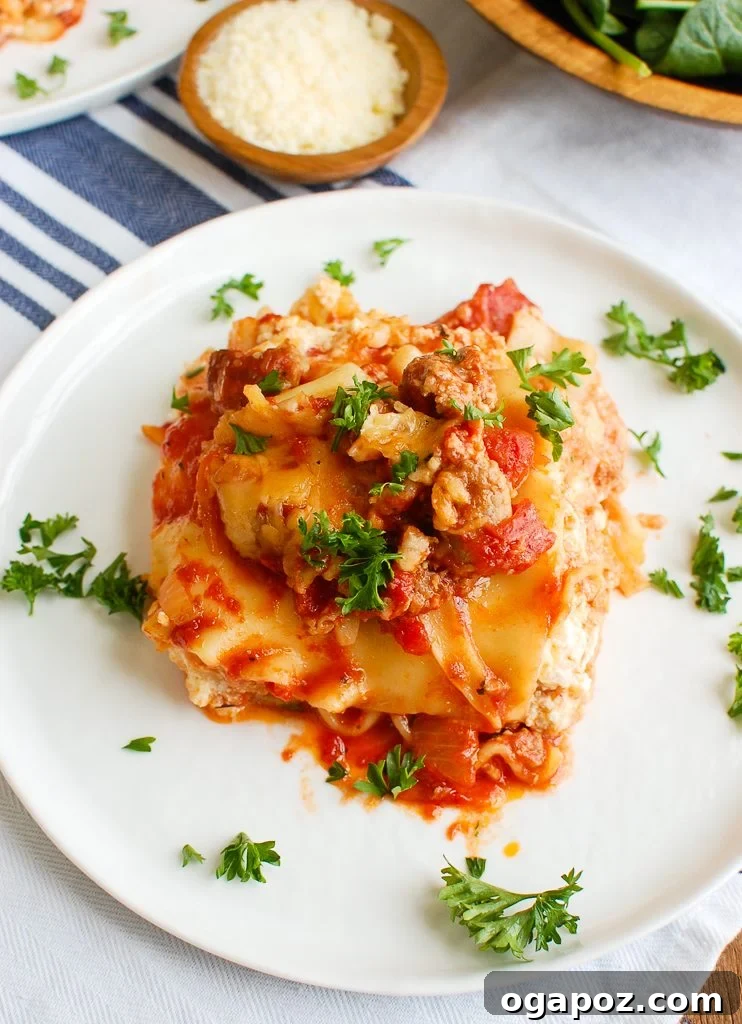 Slow Cooker Lasagna Perfection 5 Slow Cooker Lasagna garnished with fresh parsley and a side of serving spoon
