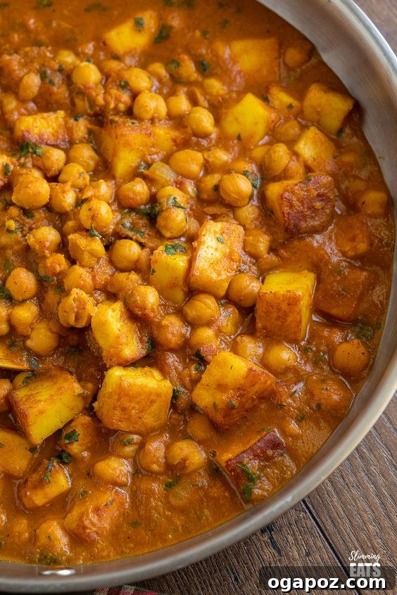 Paneer Perfection: 52+ Recipes for Every Palate 12 Robust Chana Paneer curry, a delightful combination of chickpeas and paneer, perfect for a hearty meal.