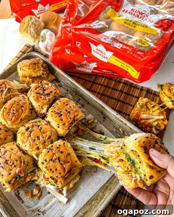 Paneer Perfection: 52+ Recipes for Every Palate 17 Adorable Paneer Sliders, perfect for kids or parties, served as delightful mini-sandwiches.