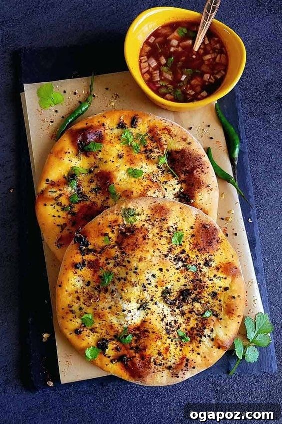 Paneer Perfection: 52+ Recipes for Every Palate 28 Warm, fluffy Paneer Flatbread (Kulcha), a delicious Indian bread stuffed with spiced paneer.