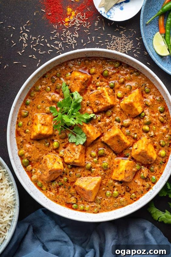 Paneer Perfection: 52+ Recipes for Every Palate 36 Rich and Creamy Matar Paneer, a restaurant-quality dish featuring paneer and green peas in a velvety cashew-tomato gravy.